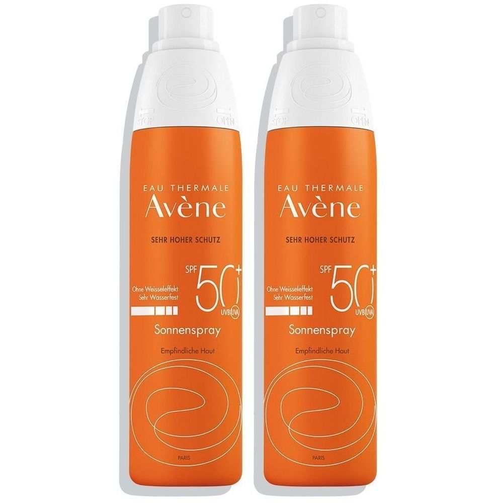 Twee oranje sprayflessen met witte dop. Opschrift: Avène, SPF 50+, Sonnenspray. Voor gevoelige huid.