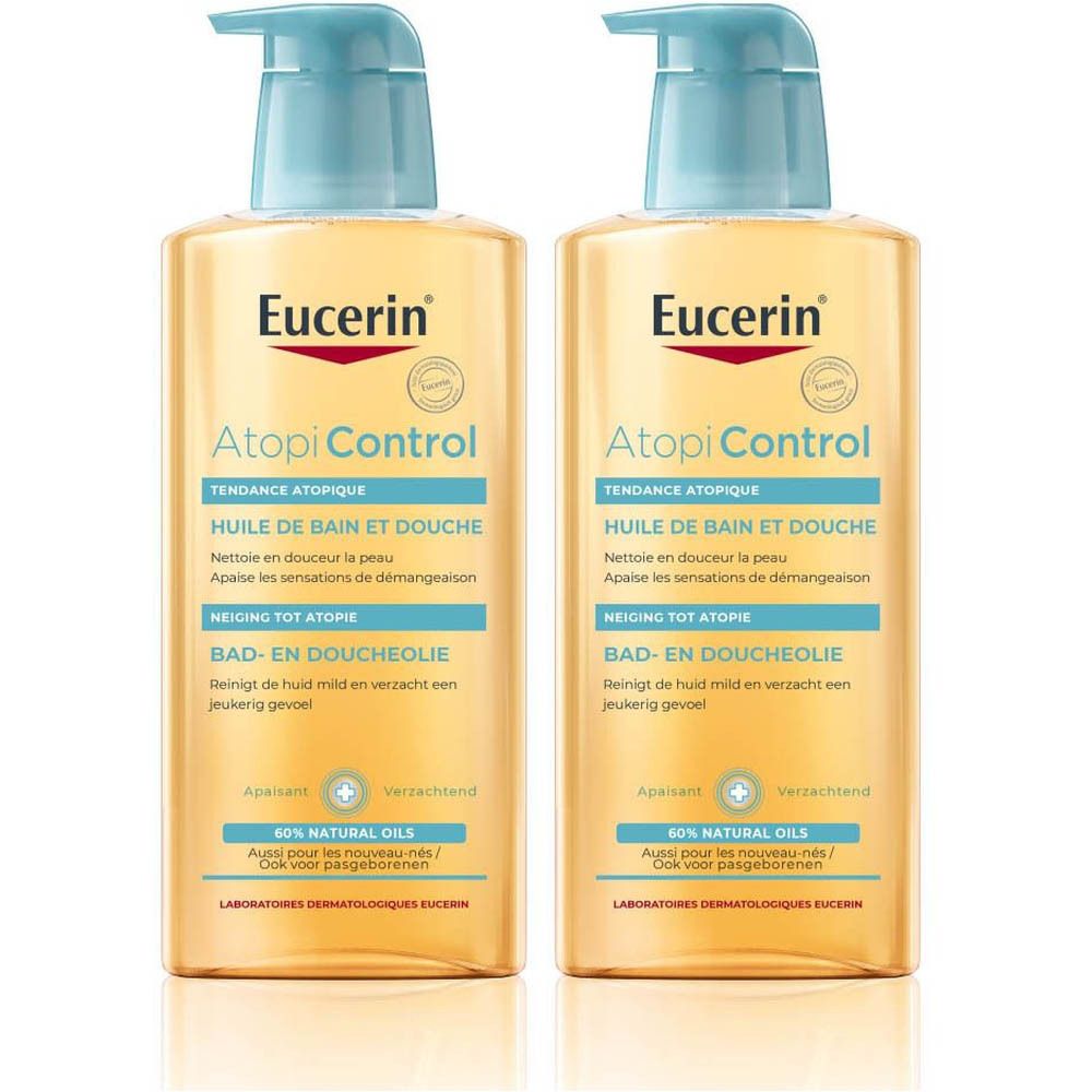 Deux flacons d'huile de bain et de douche Eucerin AtopiControl. Liquide jaune dans des flacons rectangulaires avec pompe bleue. Texte sur l'étiquette.