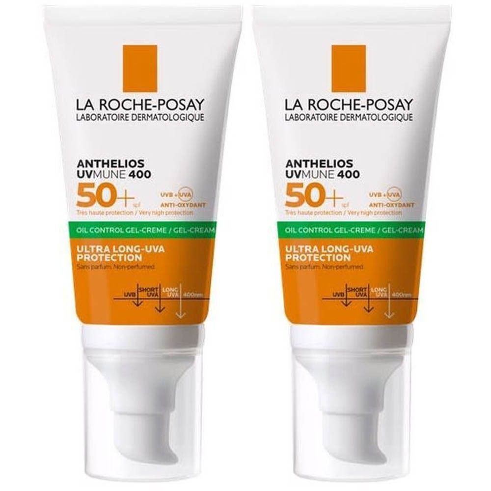 Deux tubes de crème solaire. Blanc, avec des accents orange et vert. Inscription : La Roche-Posay, Anthelios UVMUNE 400 50+.