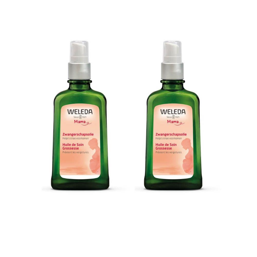 Twee groene flessen met verstuiver. Opschrift: Weleda Mama, Huile de Soin Grossesse. Illustratie van een zwangere vrouw.