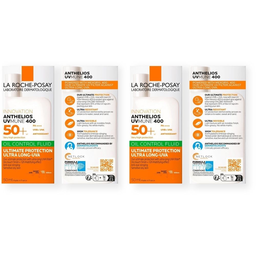 Quatre emballages La Roche-Posay Anthelios UVmune 400. Flacons blancs avec accents orange. Texte: Oil Control Fluid, 50+.