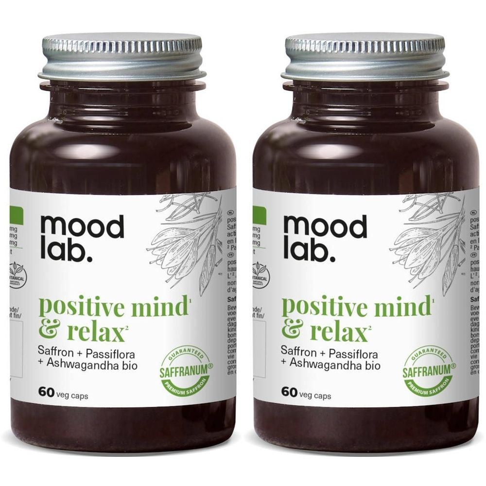 Twee bruine glazen flessen met zilveren doppen. Labels: "mood lab. positive mind & relax". Bevat 60 veg caps.
