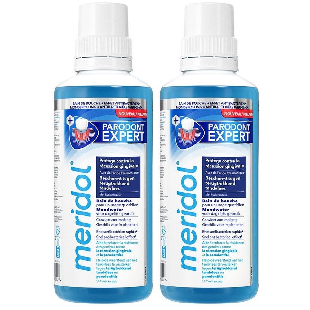 Deux flacons de bain de bouche meridol® Parodont Expert. Liquide bleu dans des flacons blancs avec des étiquettes bleues et blanches. Inscription : Parodont Expert.