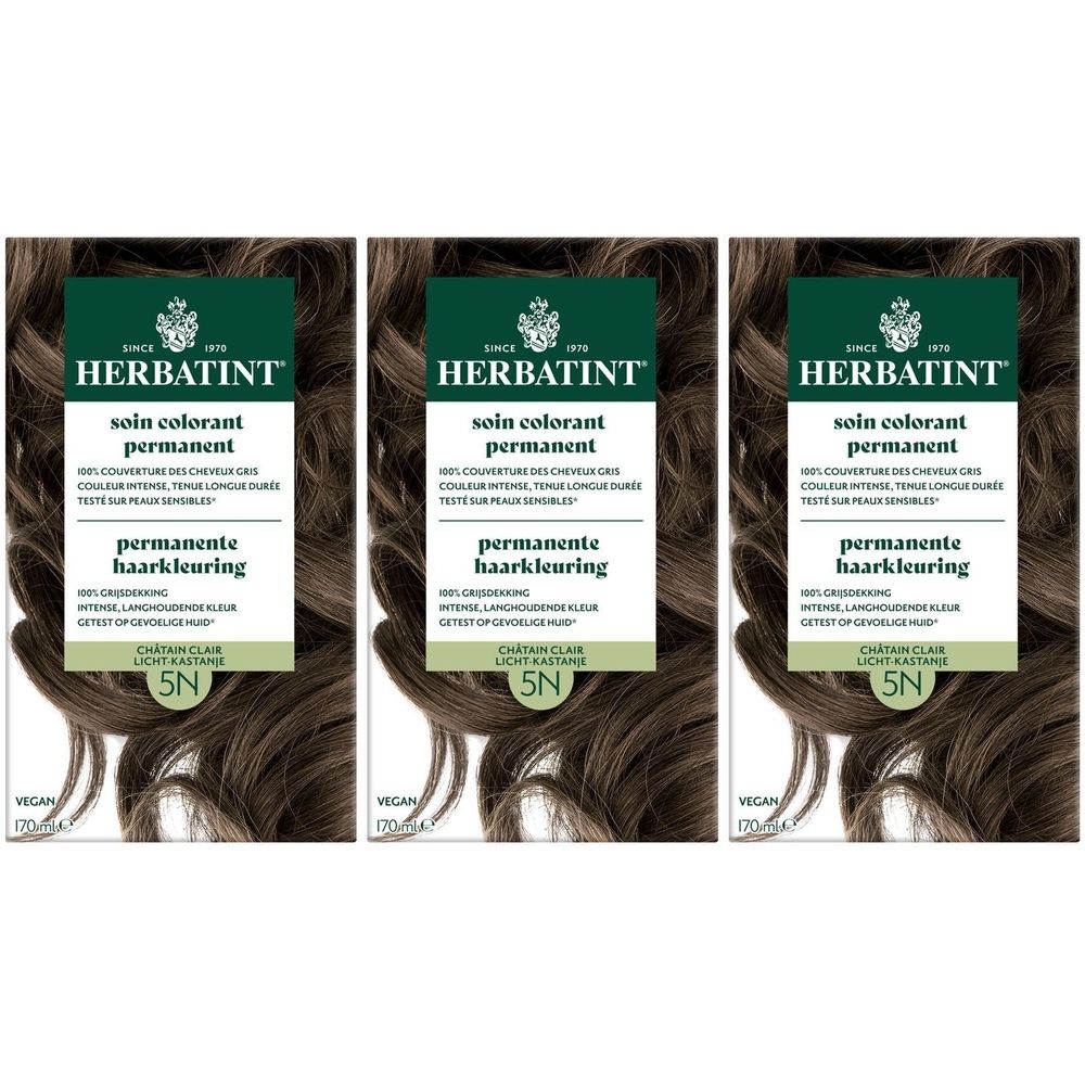 Drie dozen Herbatint Soin Colorant Permanent 5N Châtain Clair. Opschrift: permanente haarkleuring, 5N, Vegan.