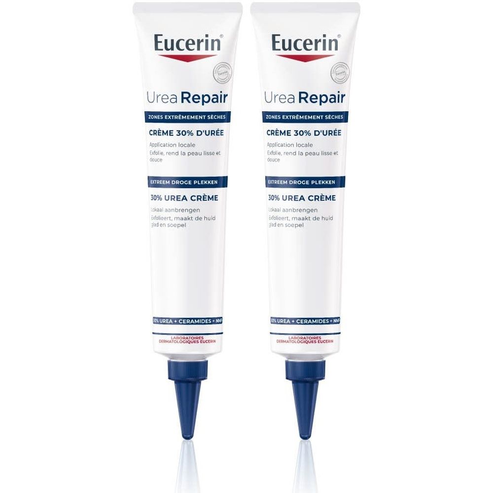 Twee tubes Eucerin UreaRepair Crème 30% d'Urée. Wit met blauwe tekst en punt. Productnaam en logo duidelijk zichtbaar.
