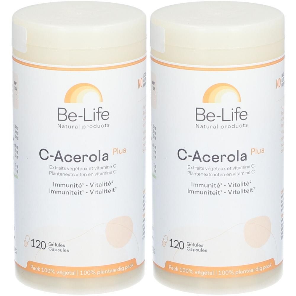 Twee witte containers met deksels. Opschrift: Be-Life, C-Acerola Plus, 120 Gelules Capsules. Verpakking 100% plantaardig.