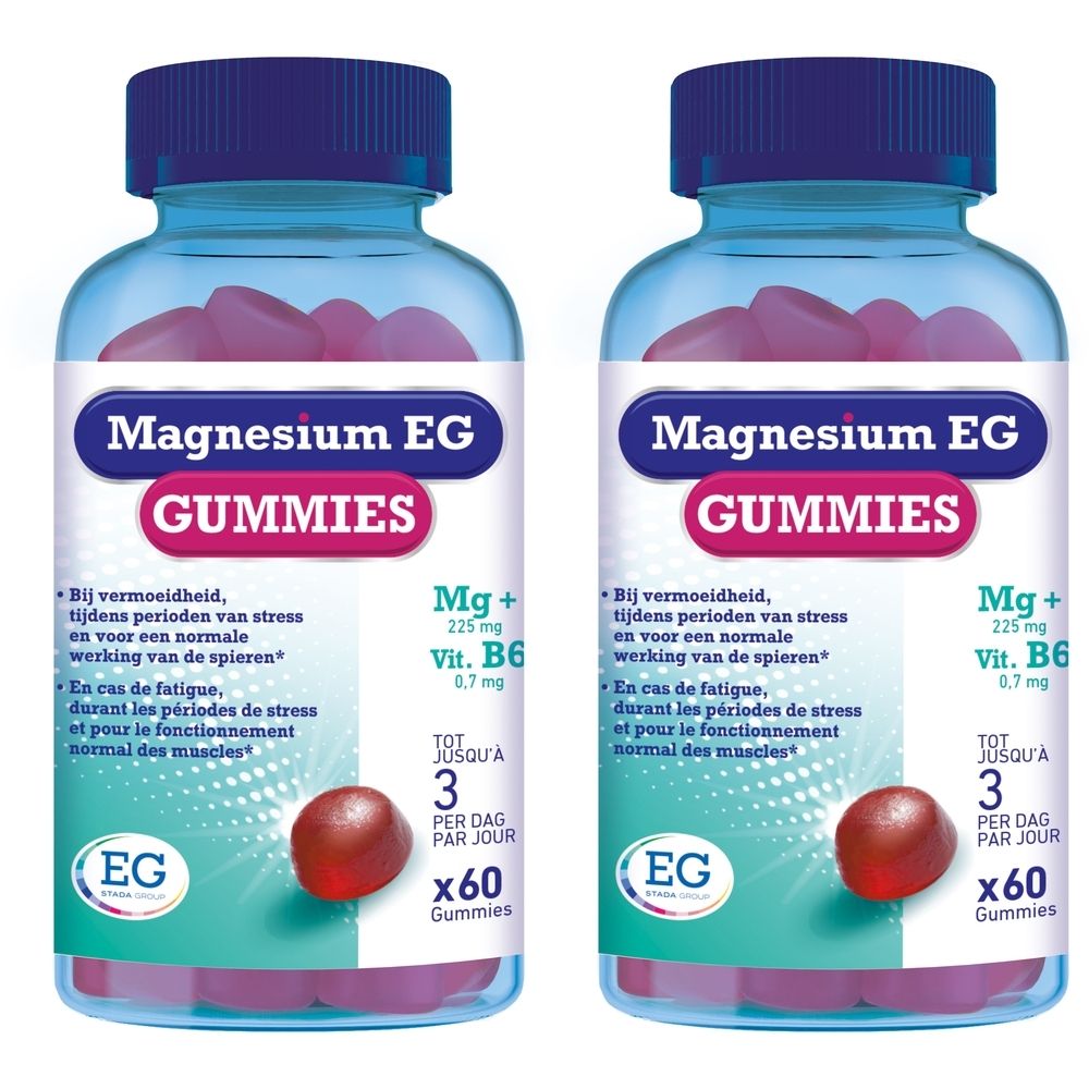 Deux flacons de Magnesium EG GUMMIES. Bouchons bleus, flacons transparents avec bonbons roses. Inscription: Magnesium EG GUMMIES, Mg+ Vit. B6.