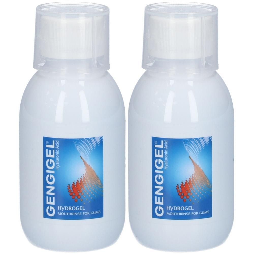 Deux flacons blancs avec bouchons blancs. Étiquettes bleues avec le mot GENGIGEL. Hydrogel bain de bouche pour les gencives.