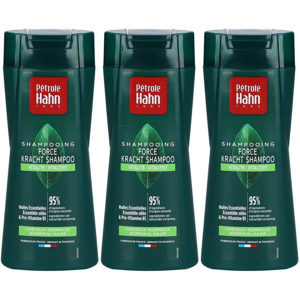 Drie groene shampoo flessen. Opschrift: Petrole Hahn, Shampooing Force Vitalité. Bevat essentiële oliën en Pro-Vitamine B5.