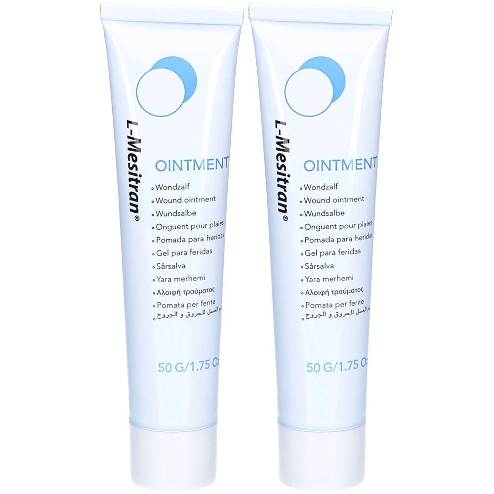 Twee tubes L-Mesitran Ointment. Witte tubes met blauwe cirkels en productaanduidingen in meerdere talen. 50 G.
