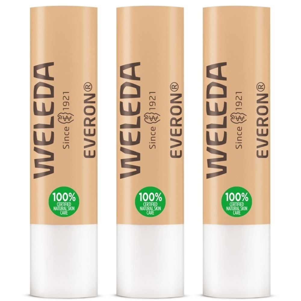 Trois sticks à lèvres. Étui beige avec texte noir : WELEDA, EVERON®. Sceau vert : 100% cosmétiques naturels certifiés.
