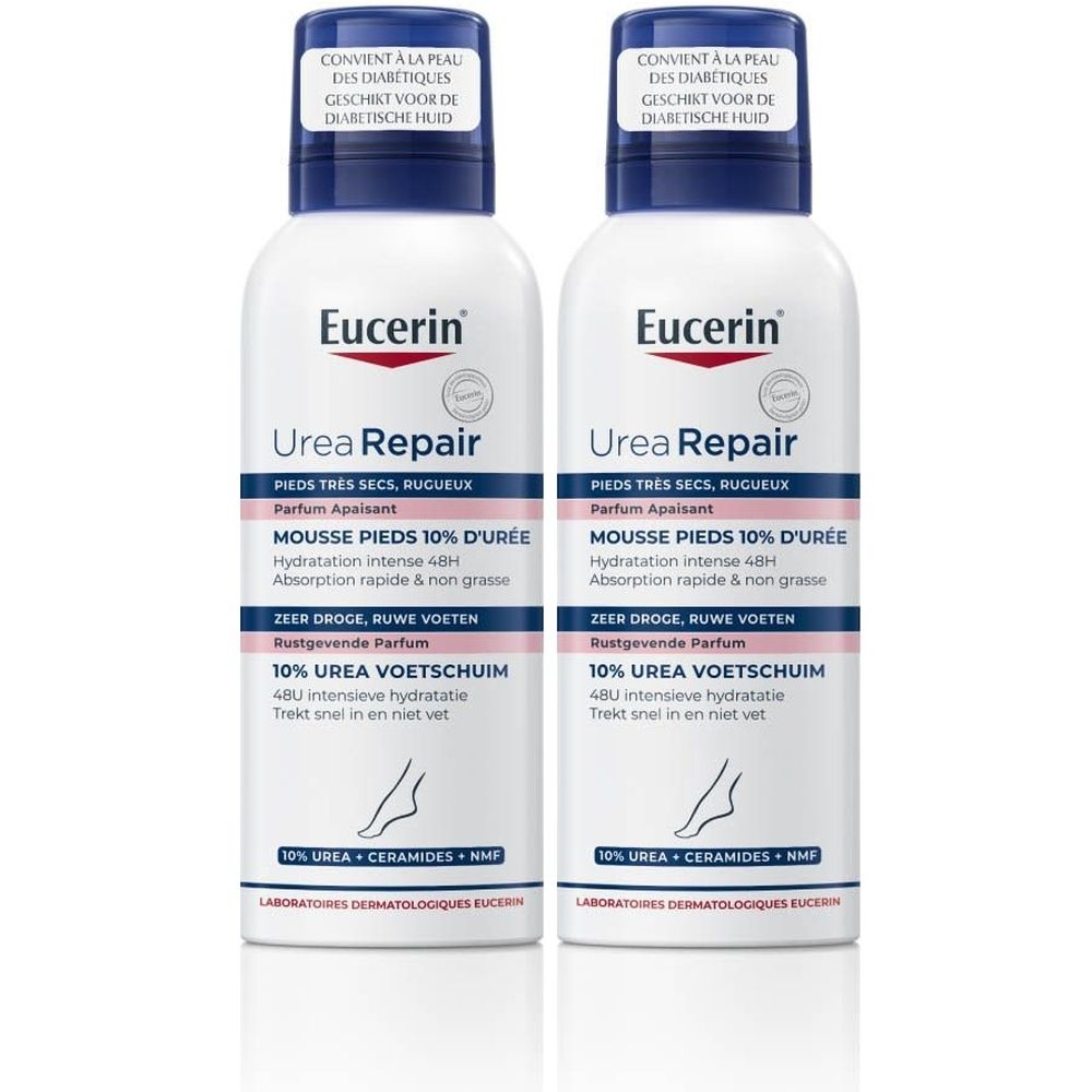 Twee witte flessen met blauwe doppen. Opschrift: Eucerin UreaRepair Mousse Pieds 10% d'Urée. Voor zeer droge, ruwe voeten.