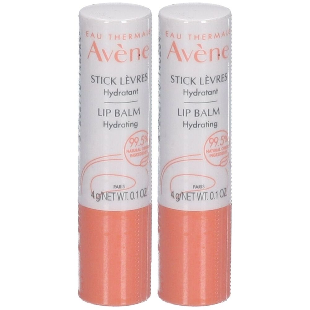 Twee lippenbalsemstiften. Witte dop, roze stick. Opschrift: Avène, Stick Lèvres, Hydratant, Lip Balm, Hydrating.