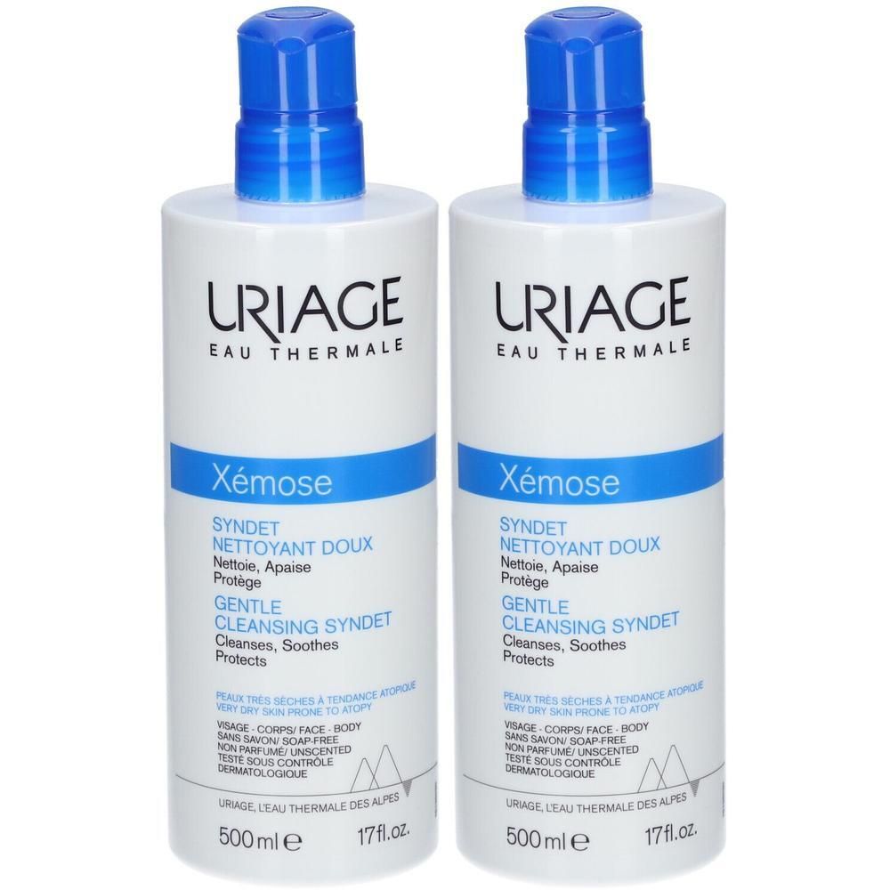Twee flessen Uriage Xemose Syndet. Witte flessen met blauwe pomp. Tekst: Gentle Cleansing Syndet, 500ml.
