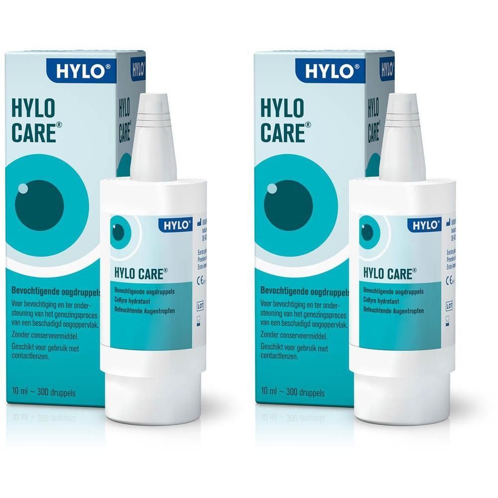 Twee flessen en verpakkingen van Hylo Care. Witte flessen met blauw etiket. Blauwe verpakking met logo en productnaam.