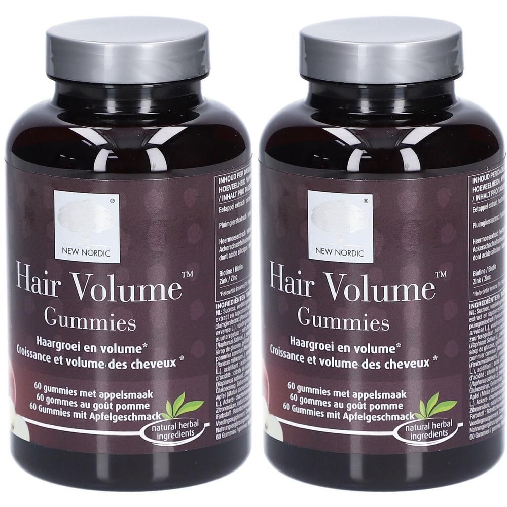 Twee flessen New Nordic Hair Volume Gummies. Bruine flessen met zilveren doppen. Opschrift: Hair Volume Gummies, 60 gummies.