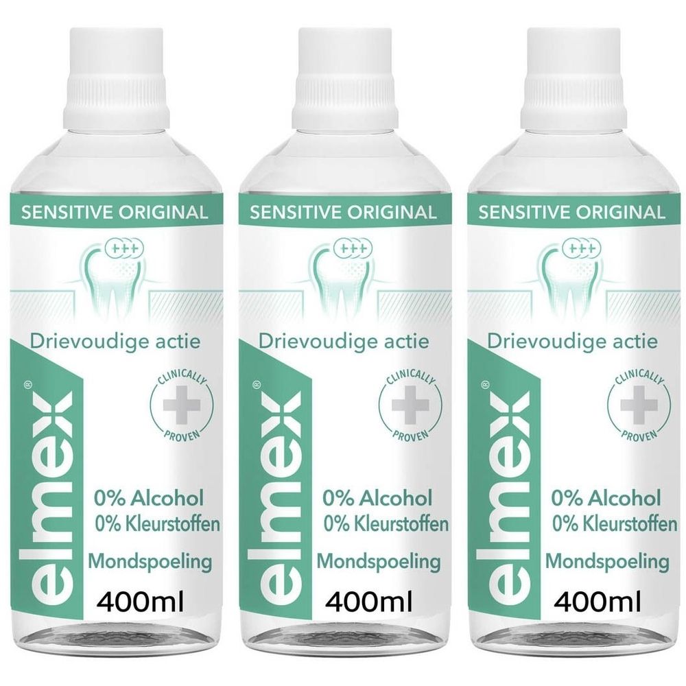 Drie flessen elmex® Sensitive mondspoeling. Witte dop, transparante fles, groene etiketten. Tekst: Drievoudige actie, 0% Alcohol.