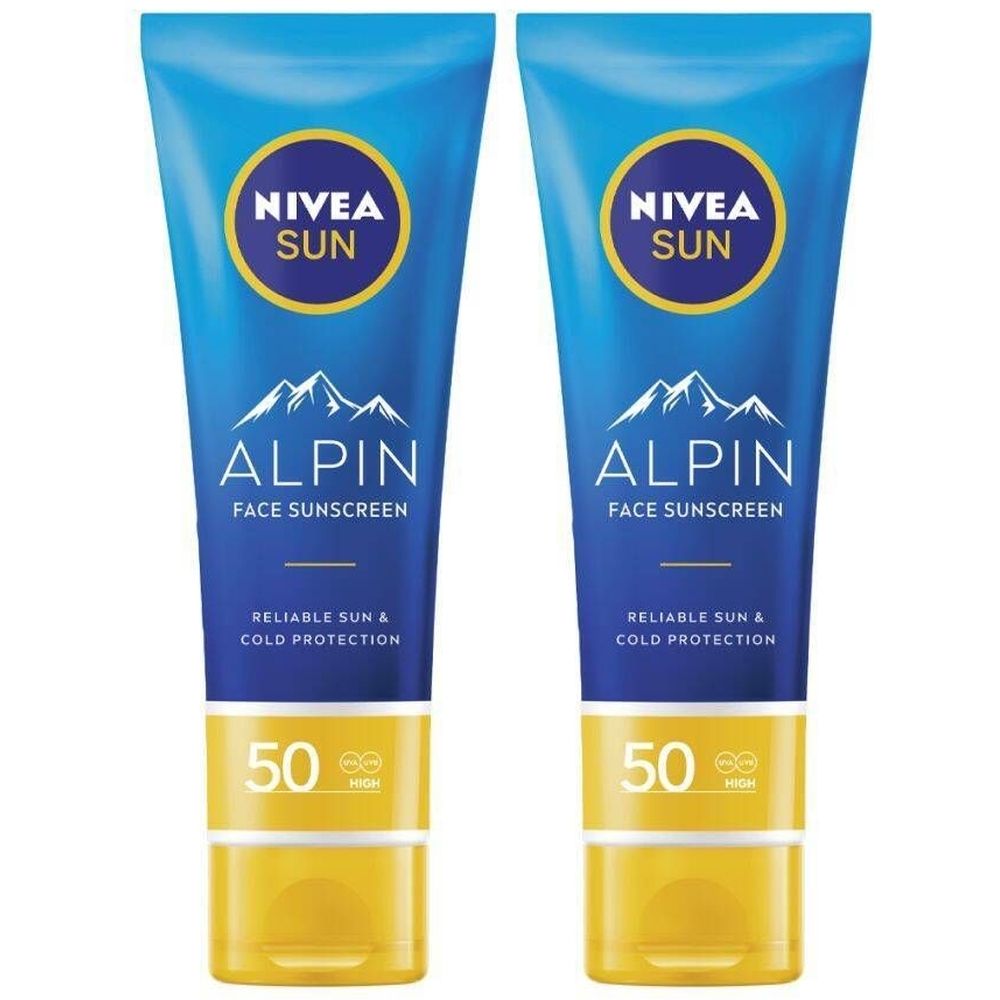 Deux tubes de crème solaire visage Alpin SPF50 Nivea Sun. Tubes bleus avec bouchon jaune. Texte: Alpin, Face Sunscreen, 50.