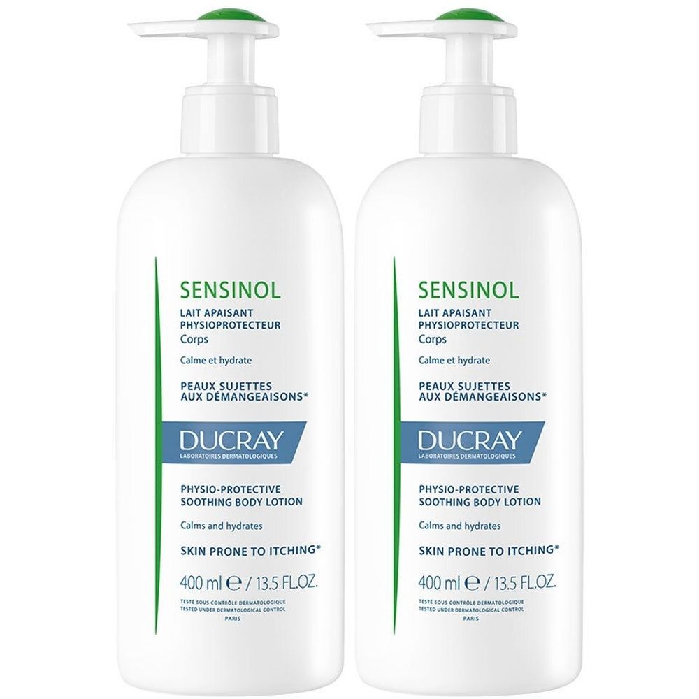 Twee witte flessen met groene opdruk. Opschrift: Sensinol, verzachtende bodylotion voor jeukende huid. Merk: Ducray.