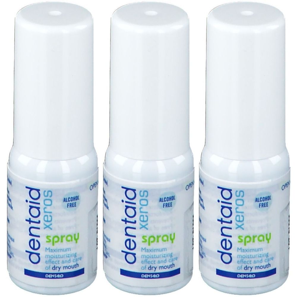 Trois flacons de spray blancs avec bouchons blancs. Chaque flacon porte l'inscription "dentaid xeros spray" en vert. "Alcohol free" est également indiqué.