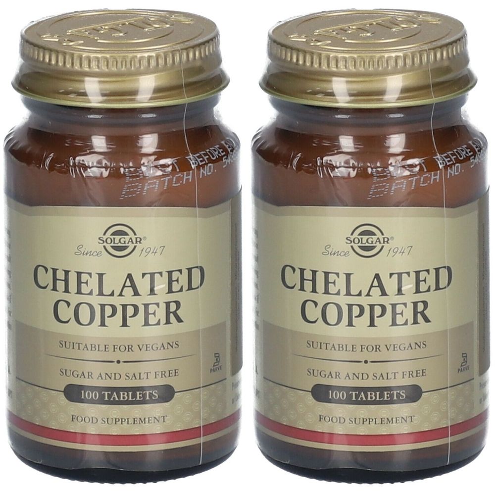 Deux flacons en verre brun avec des couvercles dorés. Les étiquettes indiquent "CHELATED COPPER" et "SOLGAR". 100 comprimés, convient aux végétaliens.