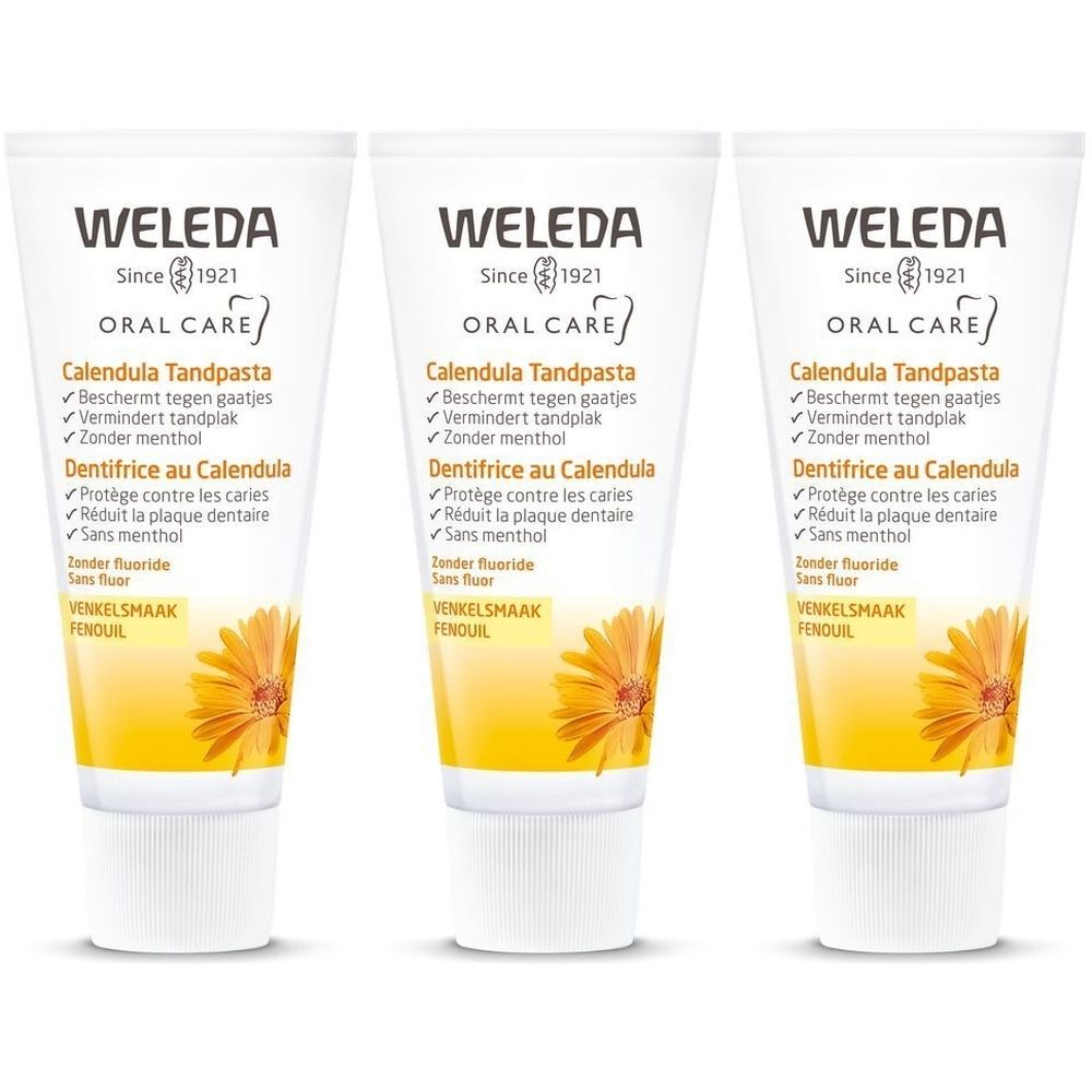 Drie tubes tandpasta. Opschrift: Weleda Oral Care, Calendula Tandpasta, Dentifrice au Calendula. Geel bloemmotief.
