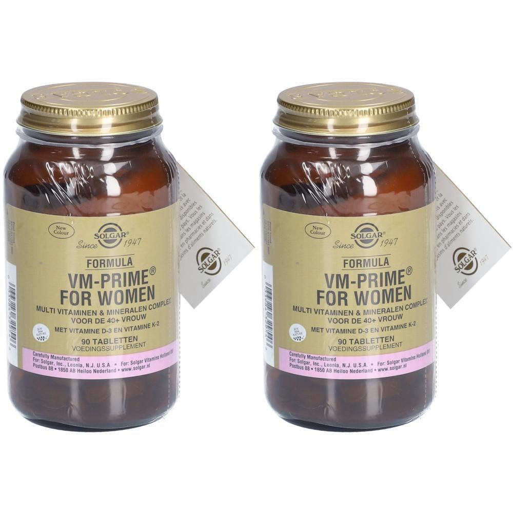 Twee flessen Solgar VM-Prime voor vrouwen. Bruine glazen flessen met gouden doppen en etiketten. 90 tabletten.