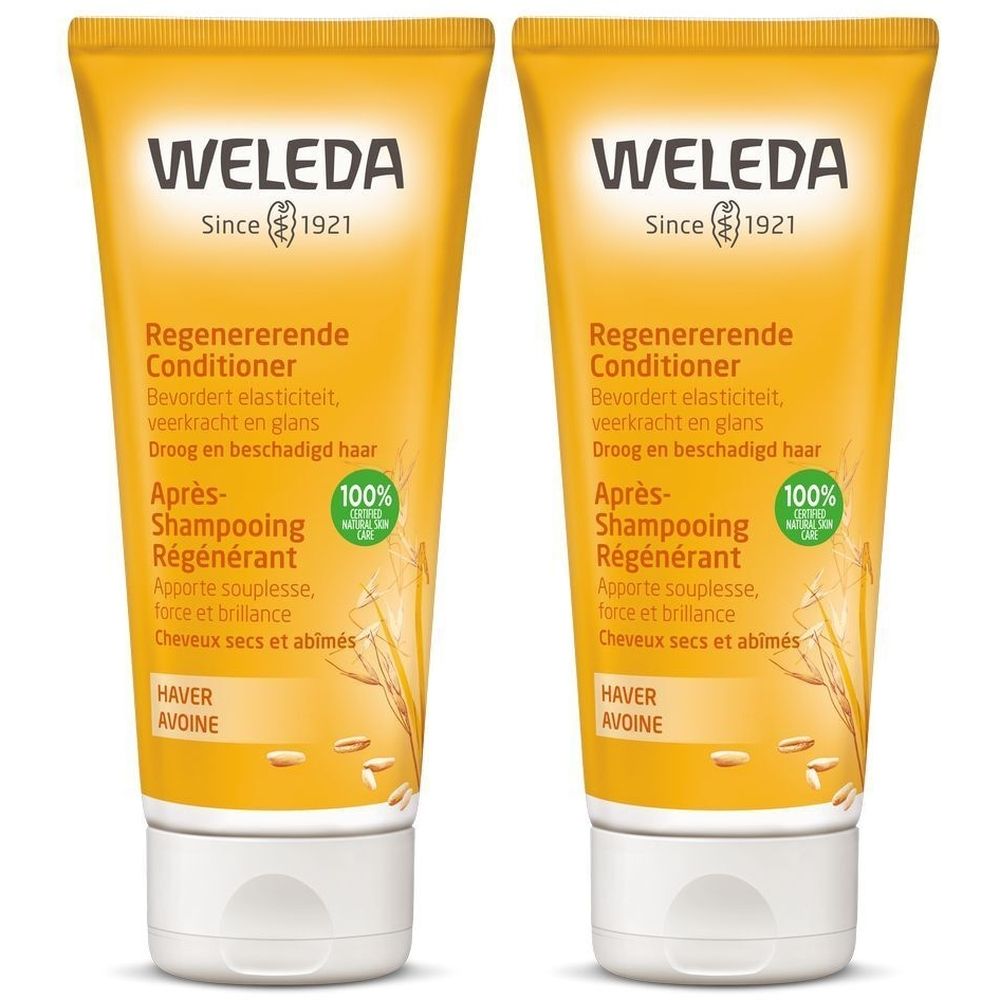Deux tubes de Weleda Après-Shampooing Régénérant. Tubes jaunes avec bouchon blanc. Inscription: Weleda, Conditioner régénérant, Avoine.