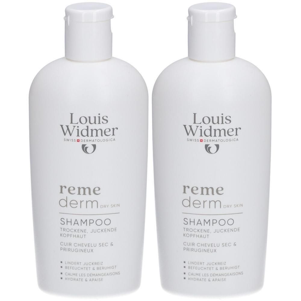 Twee witte flessen Louis Widmer Remederm Shampoo. Opschrift: Shampoo voor droge, jeukende hoofdhuid.