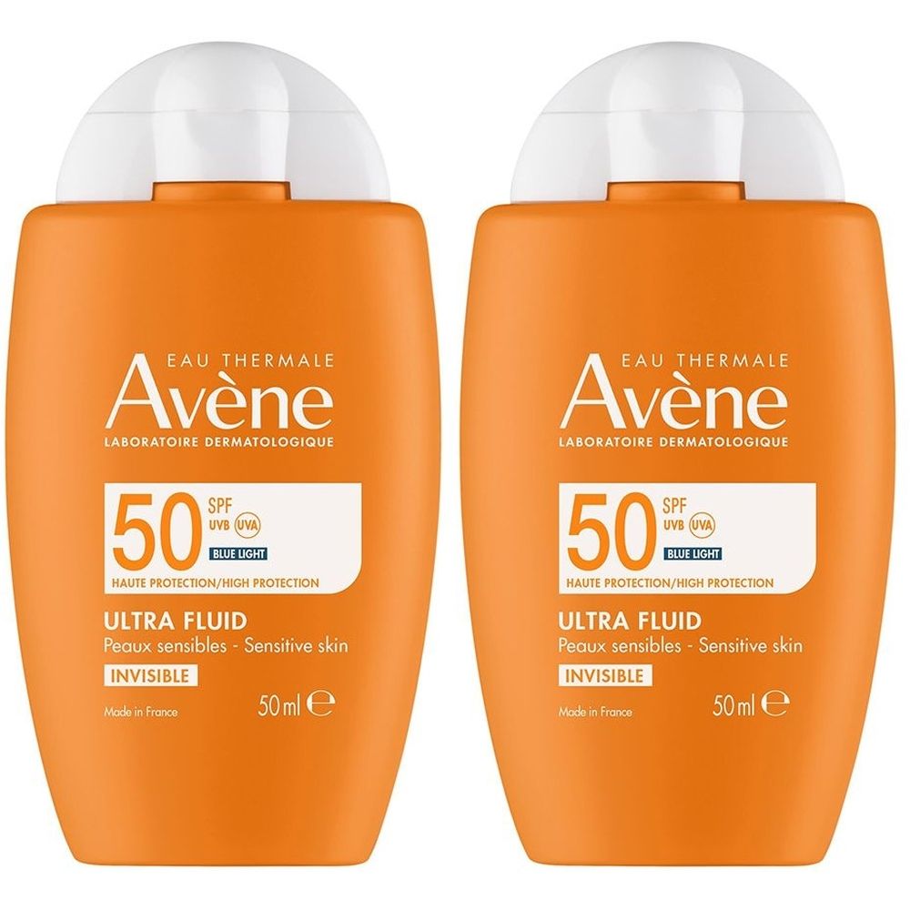 Twee oranje flacons met witte dop. Opschrift: Avène, SPF 50, Ultra Fluid, gevoelige huid. 50 ml.