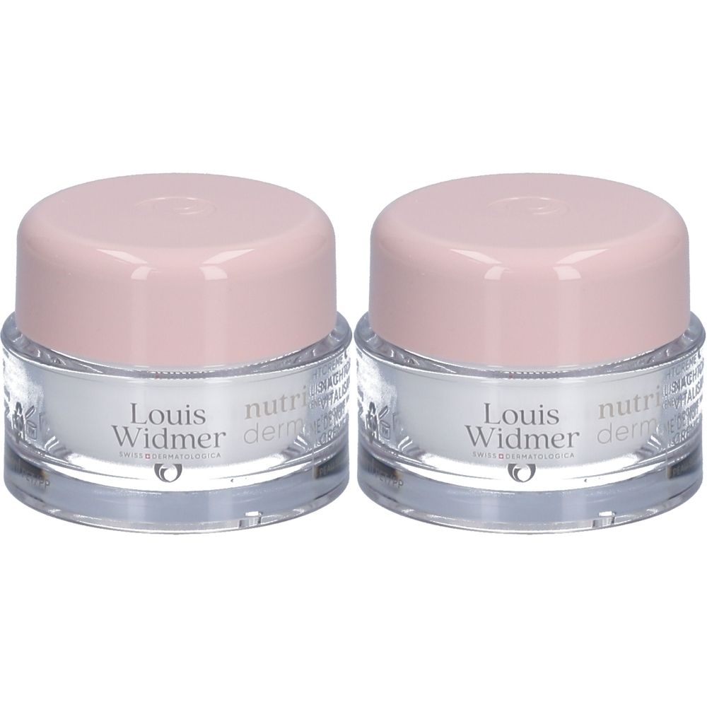 Twee potjes Louis Widmer Nutriderm nachtcrème. Glazen potjes met roze deksels. Opschrift: Nutriderm, Louis Widmer.
