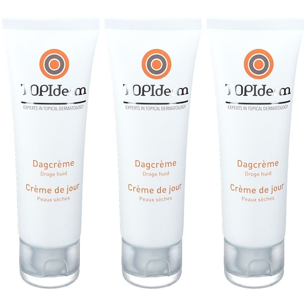 Trois tubes de Topiderm Crème Jour. Tubes blancs avec logo orange et désignations de produits. Texte: Dagcrème, Crème de jour, Peaux sèches.