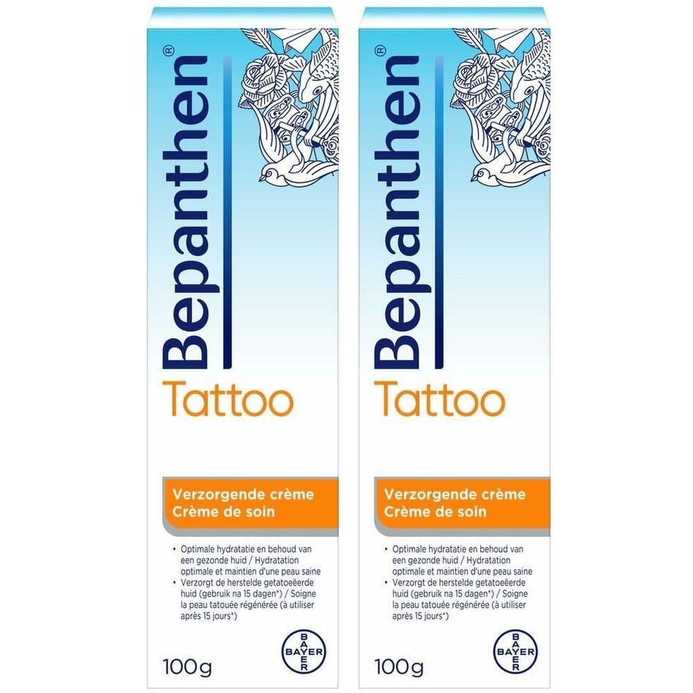 Deux tubes de Bepanthen Tattoo Crème de soin. Emballage blanc avec texte bleu et orange. Logo Bayer en bas.