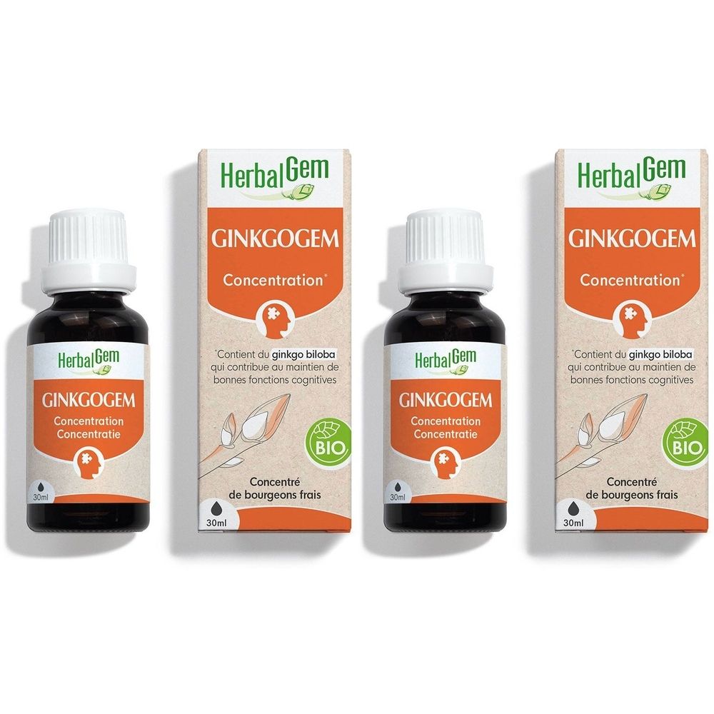 Drie flessen en verpakkingen van HerbalGem Ginkogem Bio. Bruine flessen met witte doppen, oranje verpakkingen.