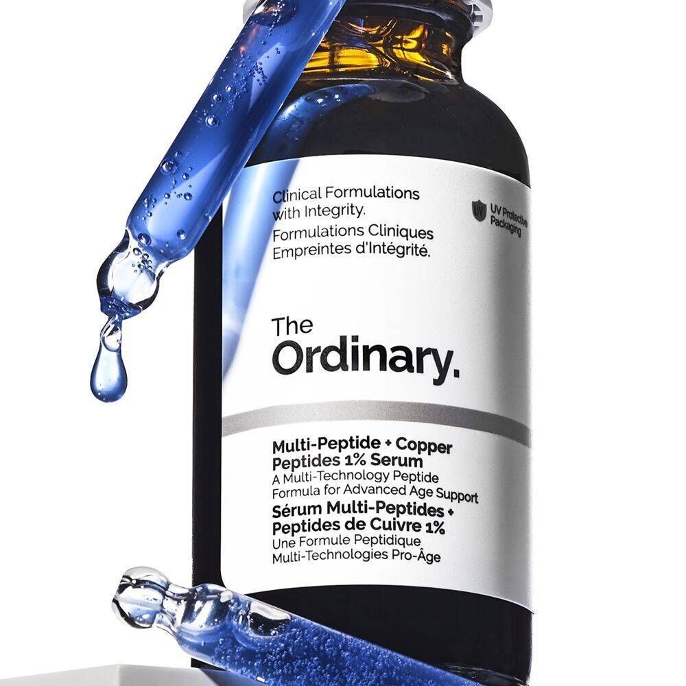 Fles The Ordinary Multi-Peptide + Copper Peptides 1% Serum met druppelaar die serum laat vallen.