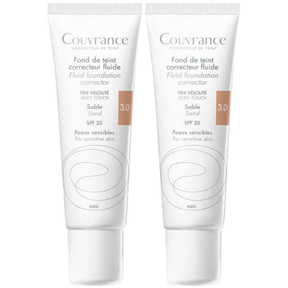 Twee tubes vloeibare foundation. Opschrift: Couvrance, Fond de teint correcteur fluide, Sable 3.0, SPF 20, Peaux sensibles.