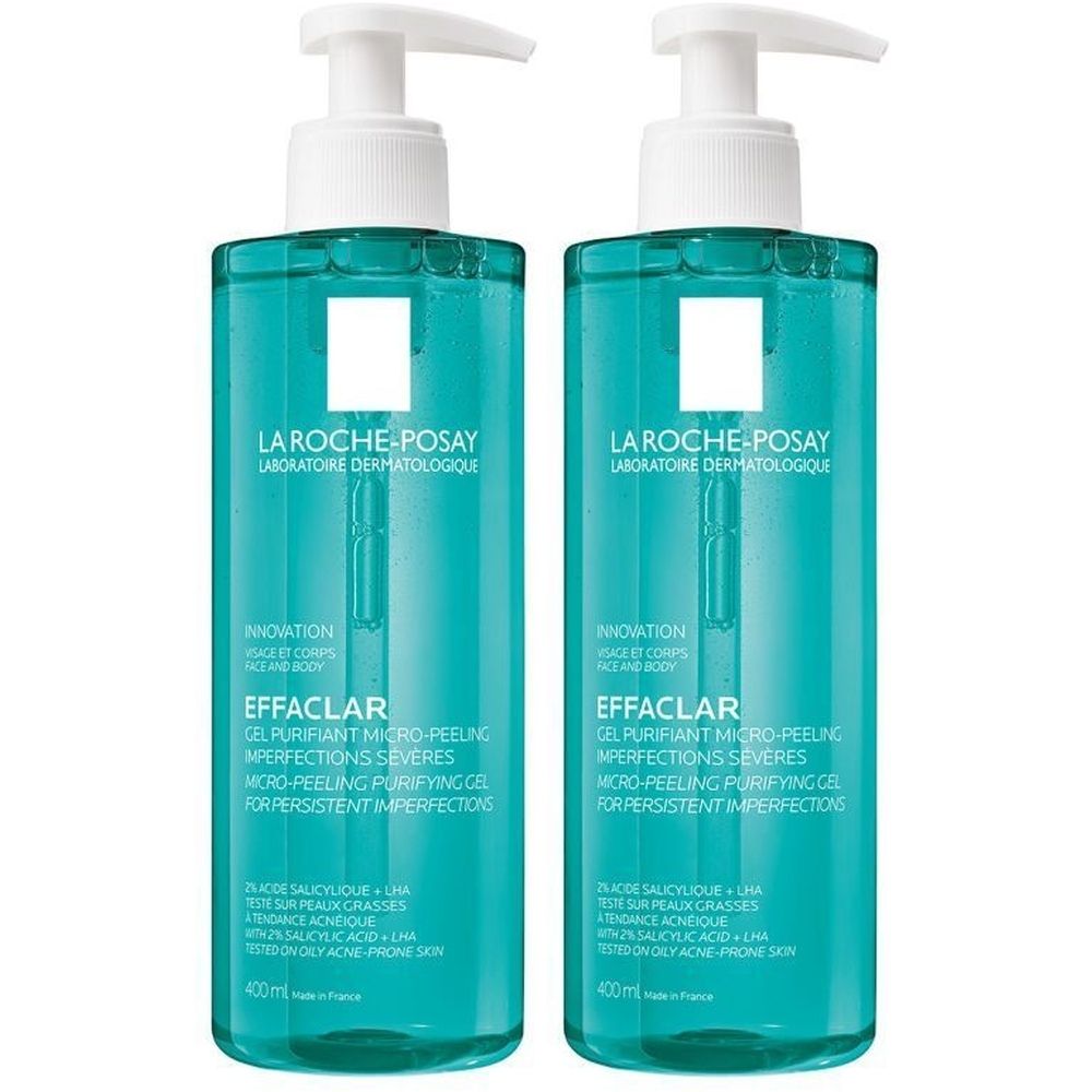 Deux flacons de gel purifiant La Roche-Posay Effaclar. Liquide turquoise avec pompe blanche. Nom du produit et marque visibles.