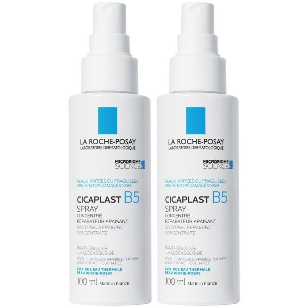 Twee witte sprayflacons van La Roche-Posay Cicaplast B5. Blauwe logo's en tekst. Opschrift: Spray, herstellend, verzachtend.