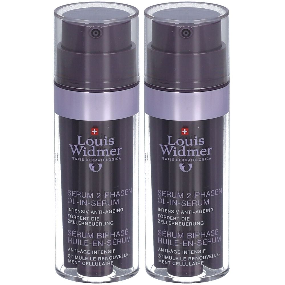 Twee flessen Louis Widmer serum. Donkerviolette flessen met pomp. Tekst: Serum 2-fasen Olie-in-serum, anti-aging.