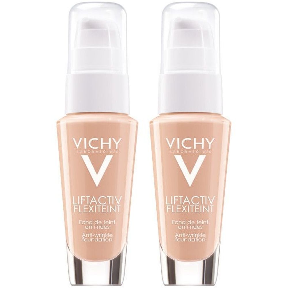 Deux flacons de fond de teint Vichy Liftactiv Flexiteint Nude. Pompes blanches, capuchons transparents. Inscription: Anti-wrinkle foundation.