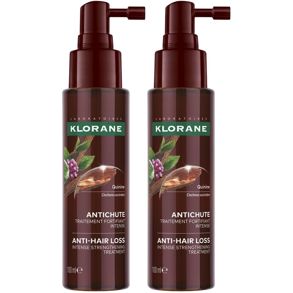 Deux flacons marron avec pompes. Inscription: Klorane, Antichute, Traitement Fortifiant Intense. 100ml.
