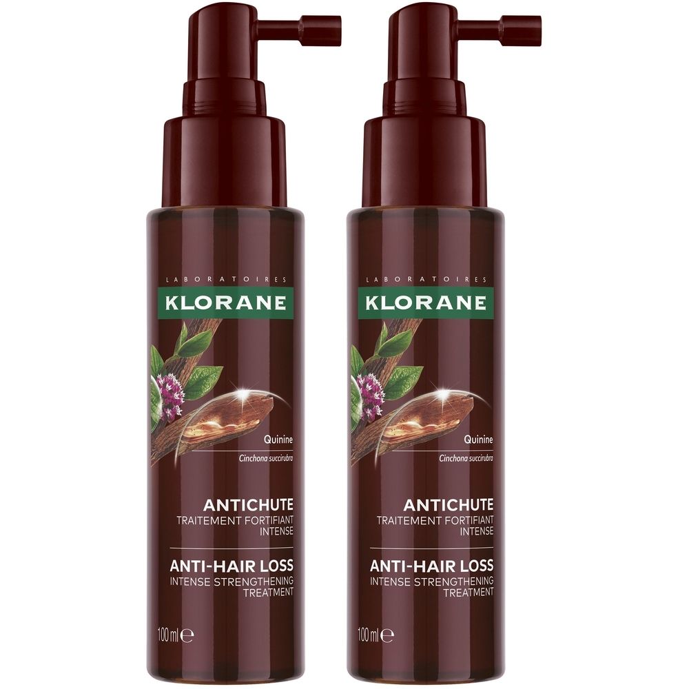 Twee bruine flacons met pompen. Opschrift: Klorane, Antichute, Traitement Fortifiant Intense. 100ml.