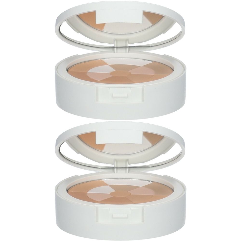 Twee witte poederdozen met spiegel en mozaïekpoeder. Deksel open.