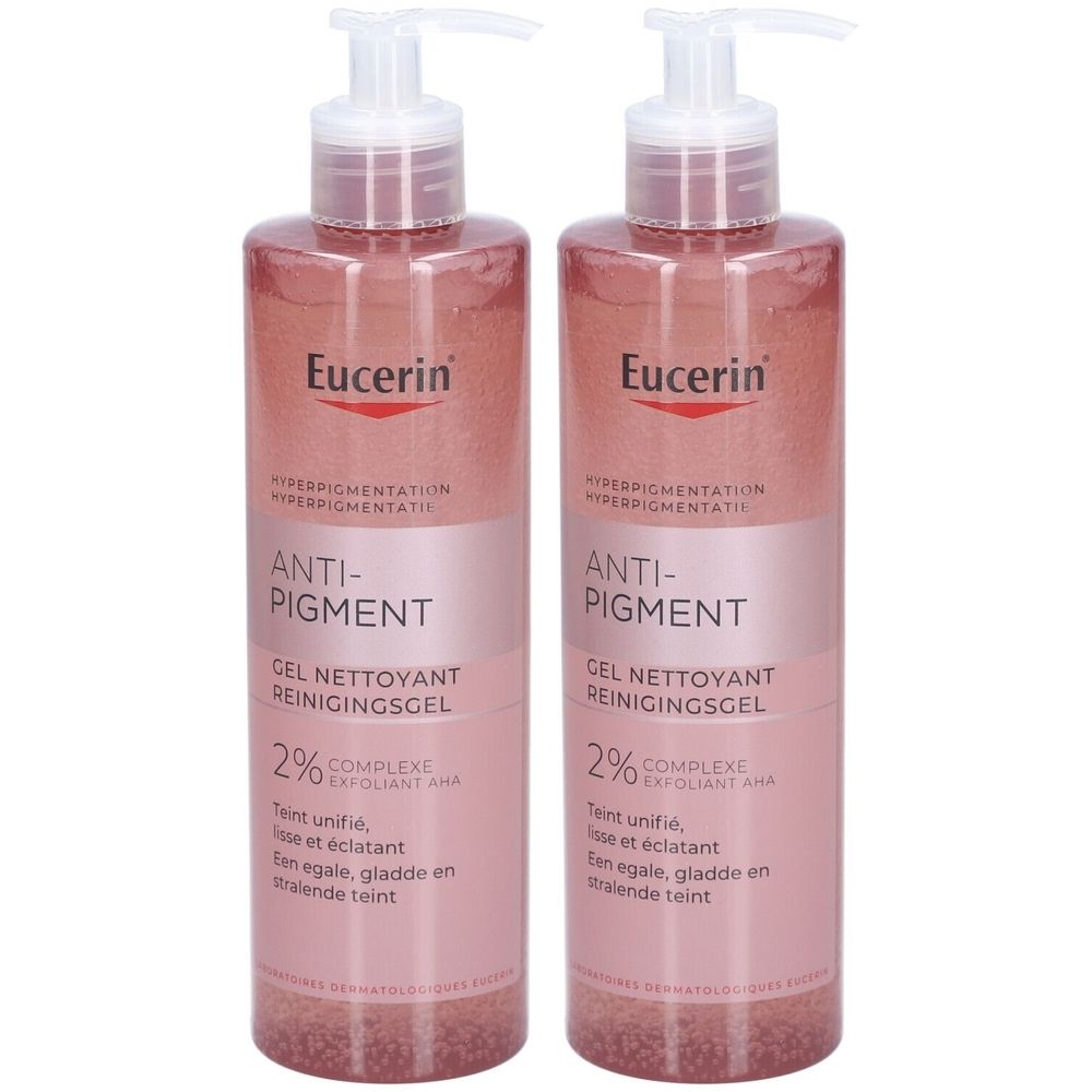 Deux flacons de gel nettoyant Eucerin Anti-Pigment. Liquide rose dans des flacons transparents avec pompe. Inscription : Anti-Pigment, 2% AHA.