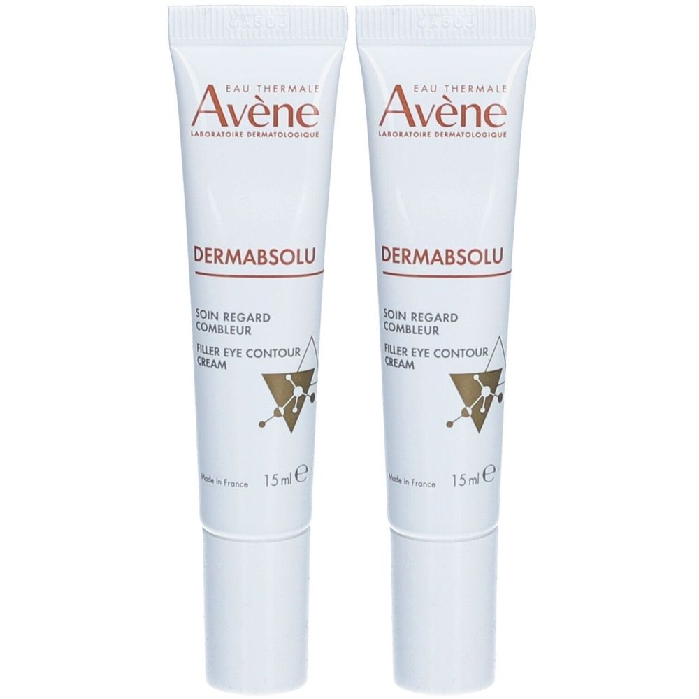 Twee tubes Avène Dermabsolu oogcrème. Wit, met tekst en logo. 15ml. Made in France.