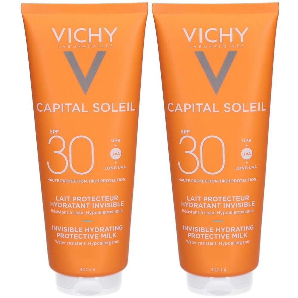 Deux tubes orange avec texte blanc. Inscription: VICHY, CAPITAL SOLEIL, SPF 30, Lait Protecteur Hydratant Invisible.