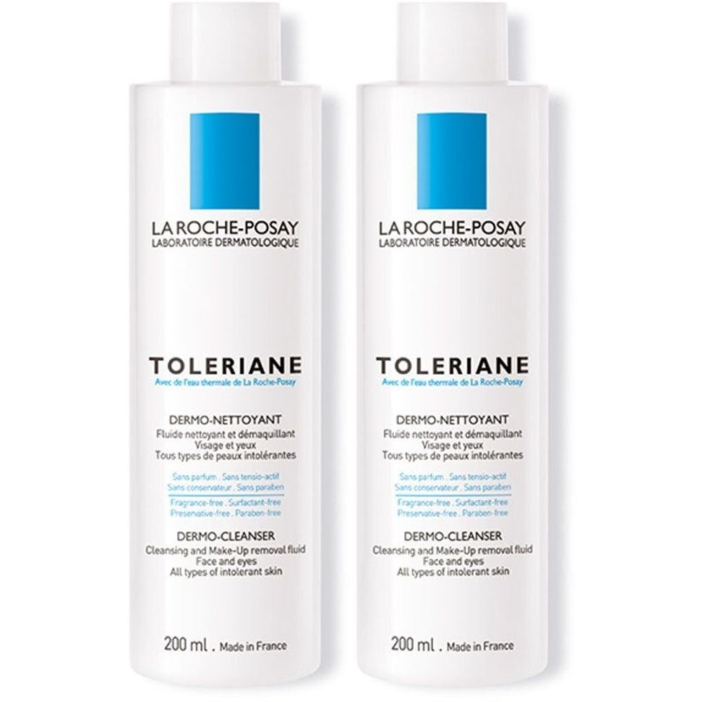 Twee witte flessen met blauw vierkant. Opschrift: La Roche-Posay, Toleriane, Dermo-Nettoyant, 200 ml.