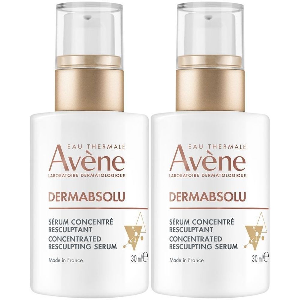 Twee witte flacons met gouden pompkop. Opschrift: Avène Dermabsolu, Sérum concentré resculptant. 30 ml.