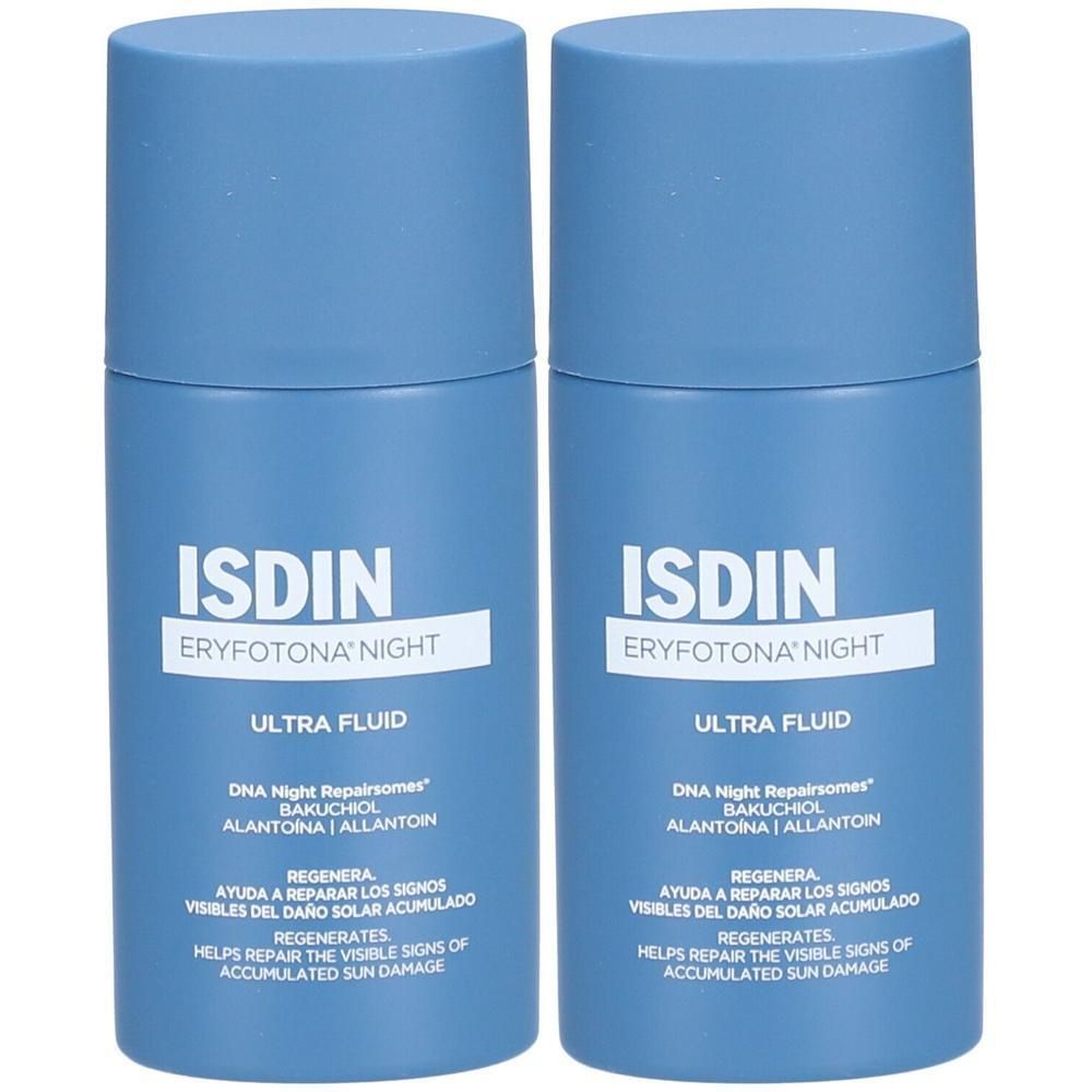 Twee blauwe flessen ISDIN Eryfotona Night Ultra Fluid. Witte tekst, productinformatie.