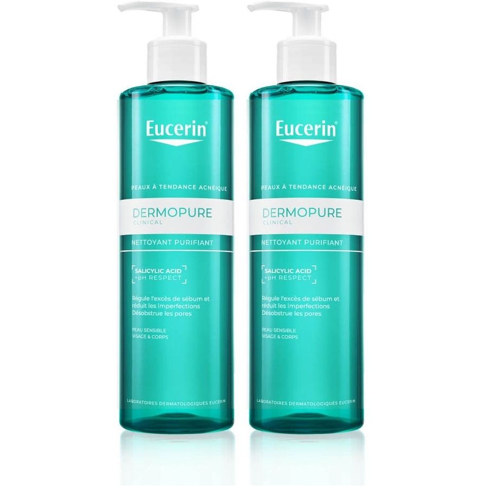 Deux flacons de Eucerin DERMOPURE CLINICAL Nettoyant Purifiant. Flacons turquoise avec étiquette blanche et pompe.